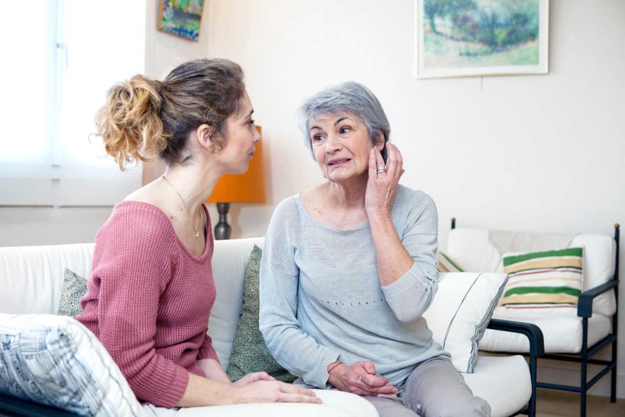 Two women talking about hearing loss