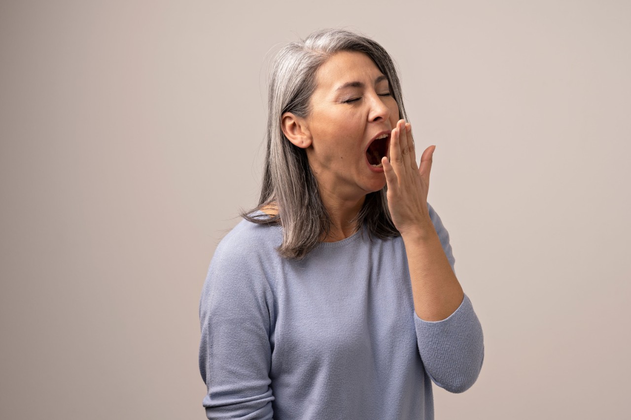 Woman yawning